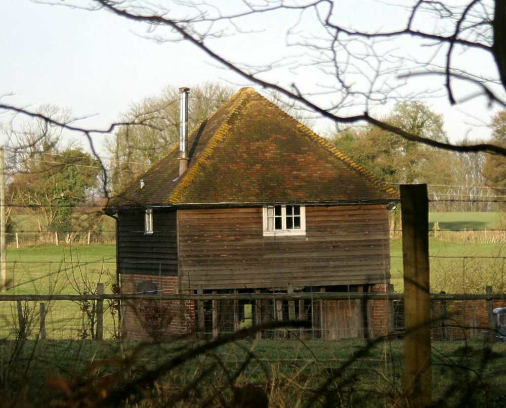 View of the Granary from nearby woodland